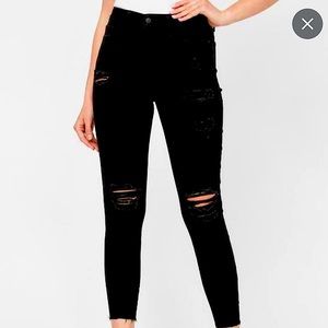 Size 28 Guess Sexy curve distressed black denim. Barely worn.